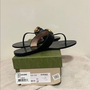 Gucci Black Leather Thong Sandals with Gold GG Buckle